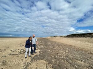 Ancient animal and human footprints unearthed on a Merseyside beach