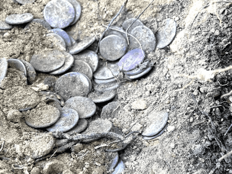 Buried treasure found in Italy with 200 Roman coins.