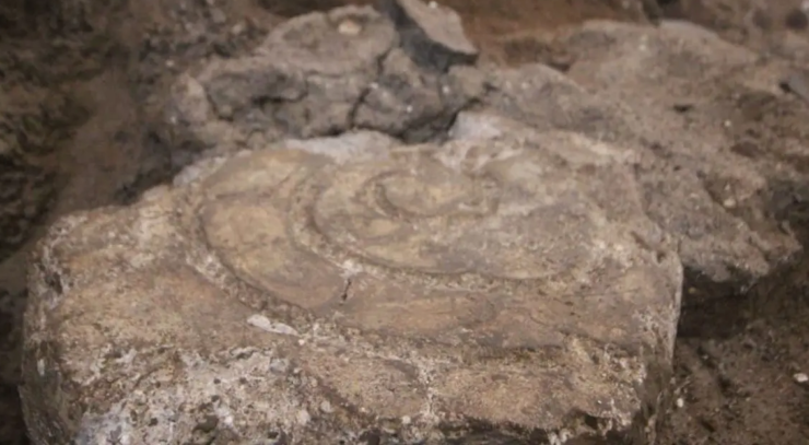 Spiral shaped stone glyph found under Mexican Church.