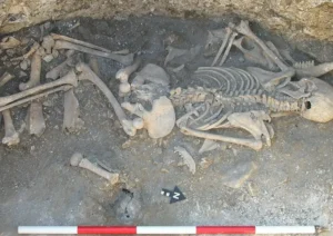 Archaeologists uncover an Iron Age human sacrifice in England.